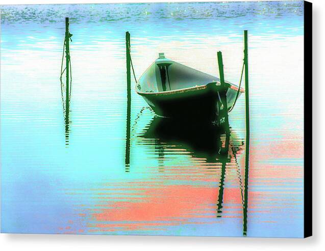 a boat sitting in the middle of a body of water