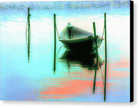 a boat sitting in the middle of a body of water