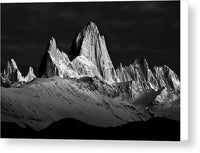 a black and white photo of a mountain range